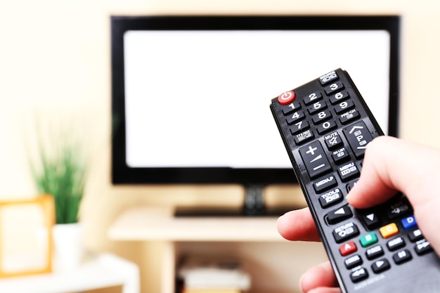 watching tv and using remote controller