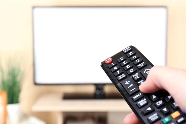 watching tv and using remote controller