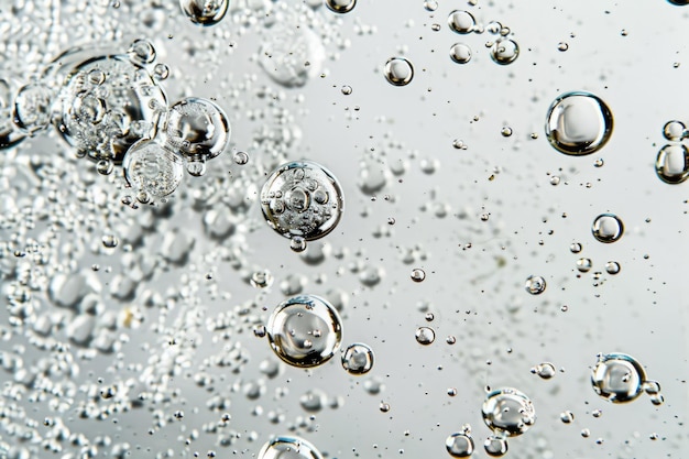 Photo water and air bubbles over white background