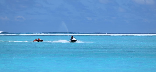 water attraction, riding on an inflatable sofa