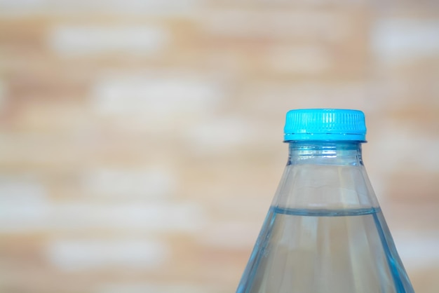 Water bottles on a bokeh background The importance of staying hydrated promoting both physical health and environmental consciousness