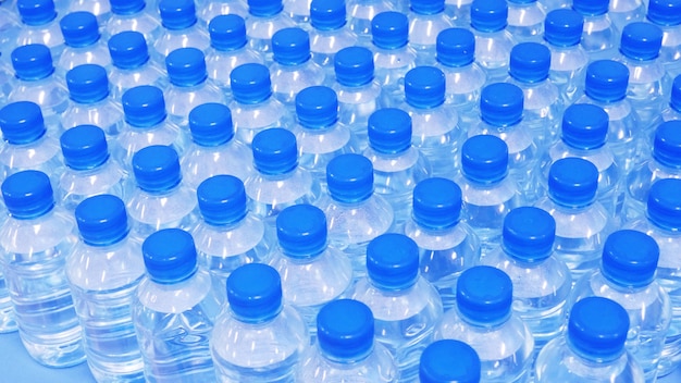 Water bottles with blue cups