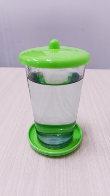 water in class with green cap
