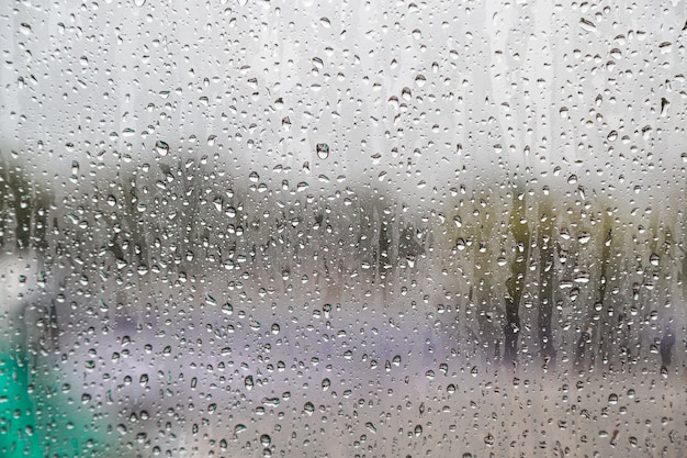 Water drop on glass windows background