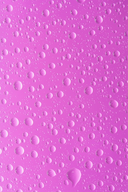 Water drop pink color background