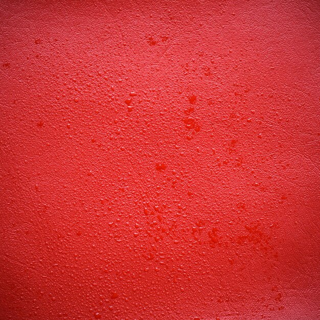 Water drop on red leather texture can be use as background