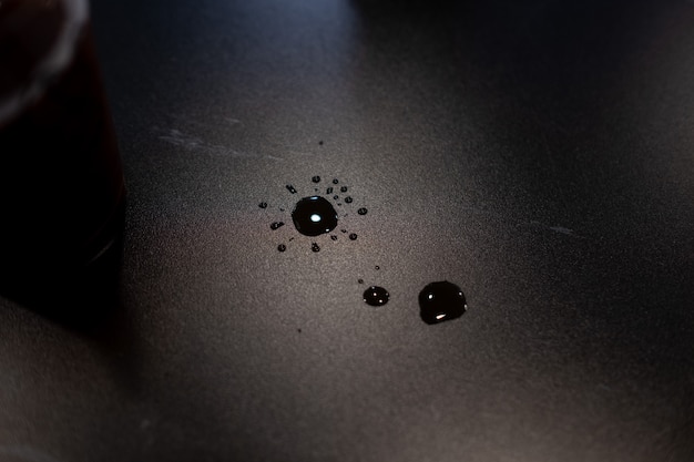 Water droplet on wood table, water stain