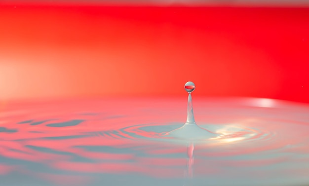 Water droplets on a blue background with moving water droplets air bubbles in water and water.