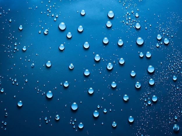 Water drops on blue background.