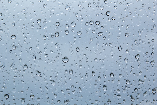 Water drops on car glassrain drops on clear window