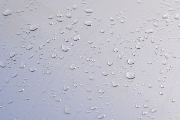 Foto l'acqua cade sul fondo di struttura del pavimento della superficie dell'automobile