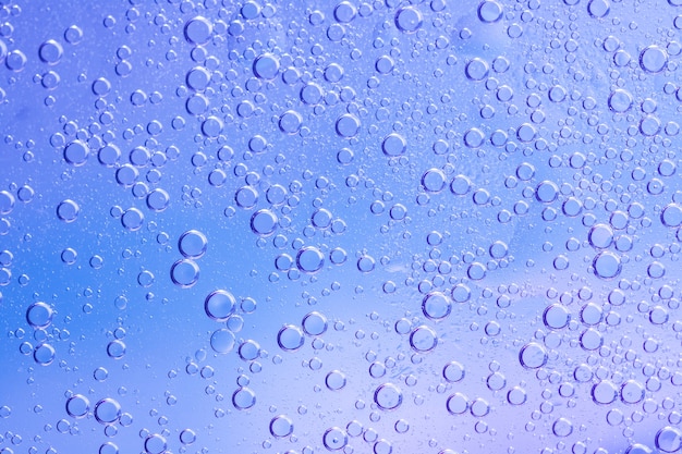 Water drops on colorful glass