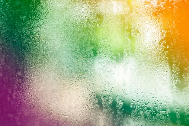 Water drops on glass background bokeh nature.