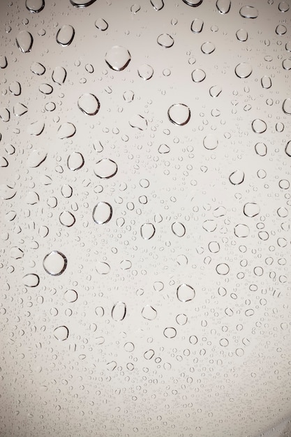 Water drops on glass background.