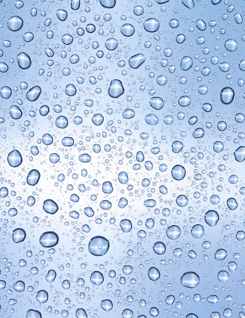 Water drops over light blue surface