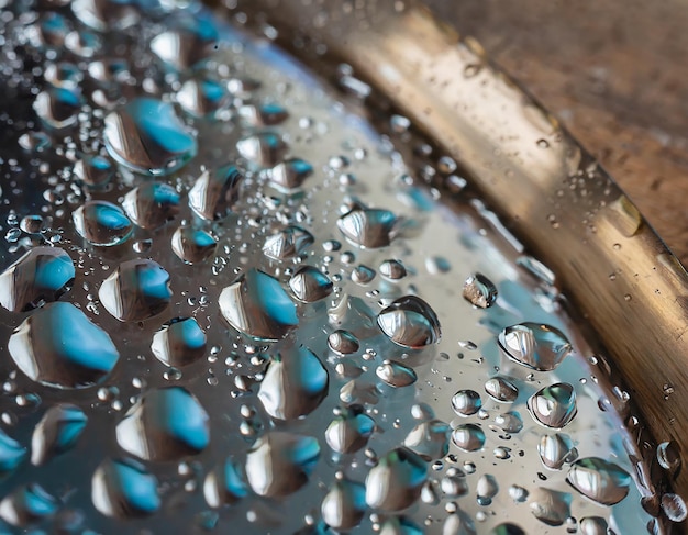 Water drops on a metal surface as a background Macro shot