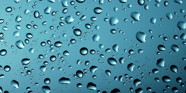 Фото Капли воды на синем стекле абстрактный фон