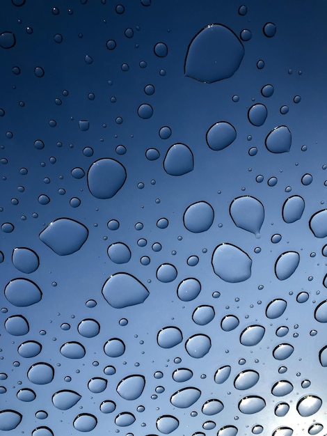 Premium Photo | Water drops through the window after the rain