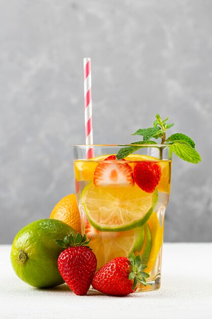 Water flavored with fresh summer fruit.