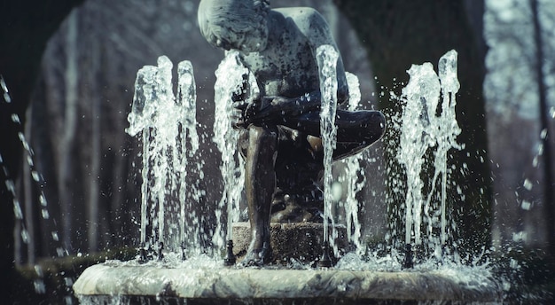 water fountains with mythological sculptures in the gardens of the Palace of Aranjuez in Spain