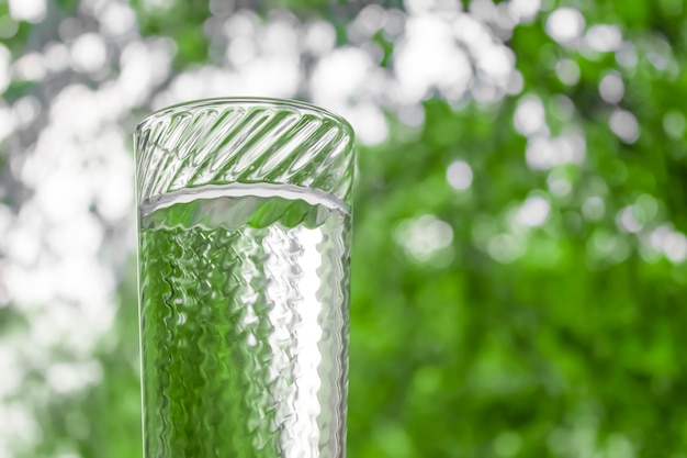 Water in a glass transparent glass on the background of the window