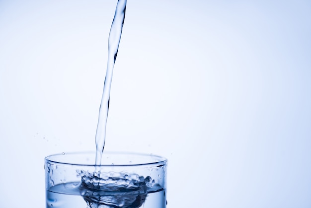 Water jet and transparent glass of water