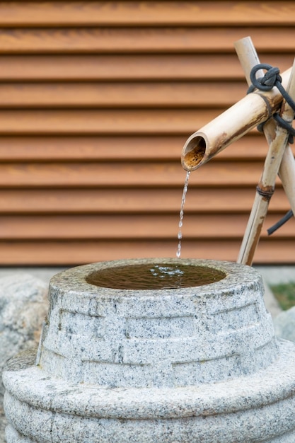 Water ladle and basin for cleansing at shrine in Kyoto Japan