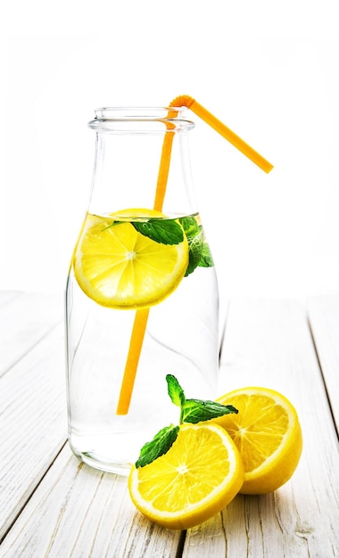 Water lemon bottle white background