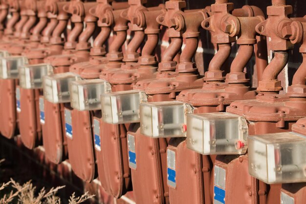 Water meters on the wall of apartment building.