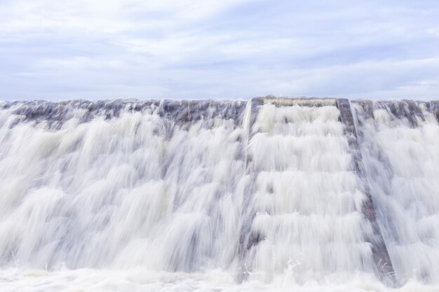 The water overflows the reservoir in the rainy season.