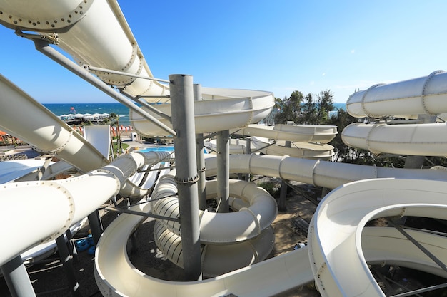 Water park summer water white slides and attractions in the resort