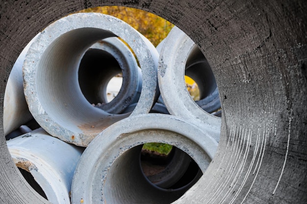 Photo water pipes for drinking water supply lie on the construction site preparation for earthworks for laying an underground pipeline modern water supply systems for a residential city