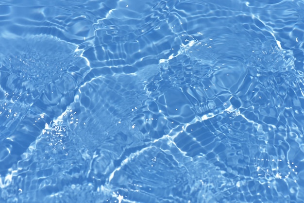 The water in the pool is blue and clear