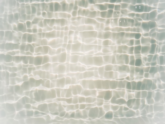 Water in a pool with light reflecting off the surface