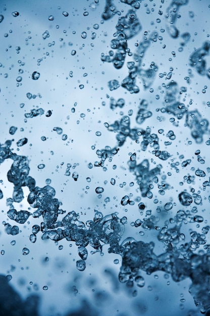 Water splash and droplets as abstract background