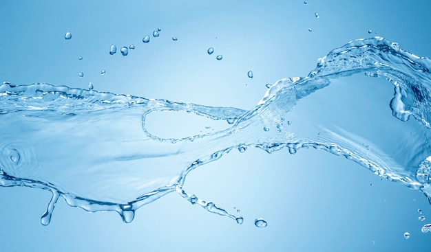 Photo water splash isolated on blue background