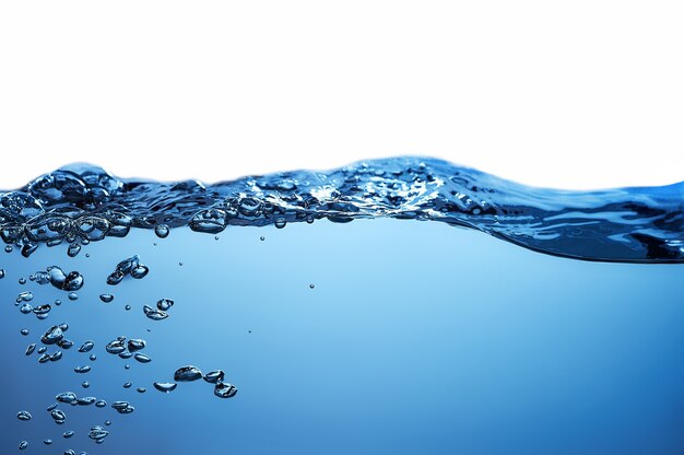 Foto spruzzi d'acqua con bolle d'aria, onda d'acqua