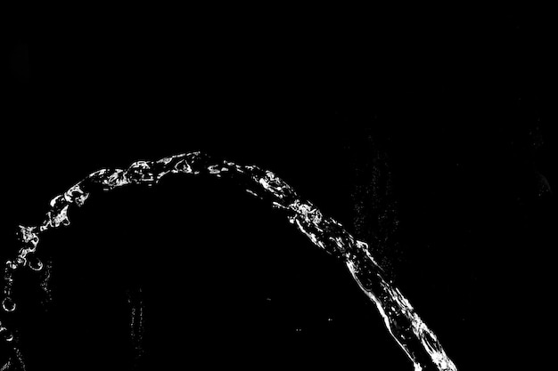 Water splashes isolated on black background white jets with drops