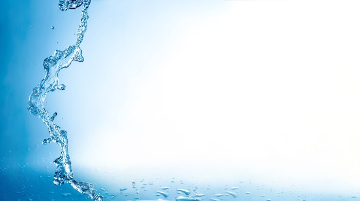 Photo water splashes with copy space blue