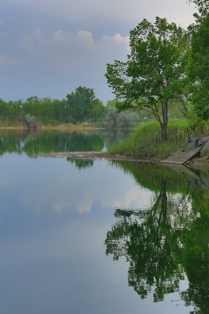 the water surface of a mountain lake mountains reflected in the water