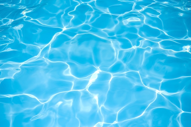 Photo water surface and ripple wave in swimming pool