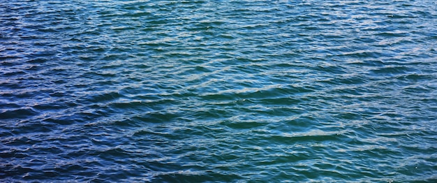 Water surface The texture of the water Waves on the lake in windy weather