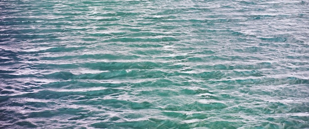 Water surface the texture of the water waves on the lake in\
windy weather