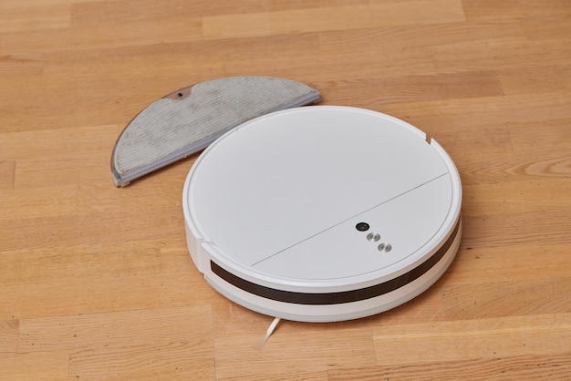 Water tank of a robot vacuum claner Mop feature with attachment