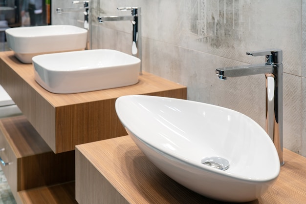 Water tap and sink in the bathroom. The interior of the living quarters.