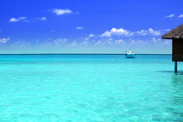 Water villas over ocean background