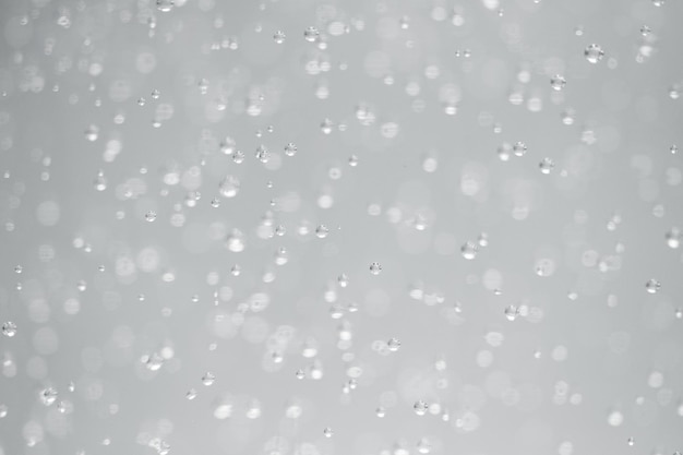 Waterbellen of carbonaatdrank close-up beweging abstracte achtergrond