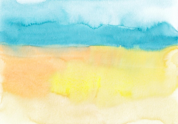 Watercolor blue yellow and orange background texture hand painted Artistic backdrop stains on paper