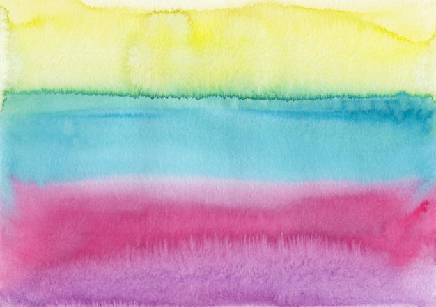 Trama di sfondo a strisce colorate ad acquerello macchie rosa blu gialle su carta dipinta a mano