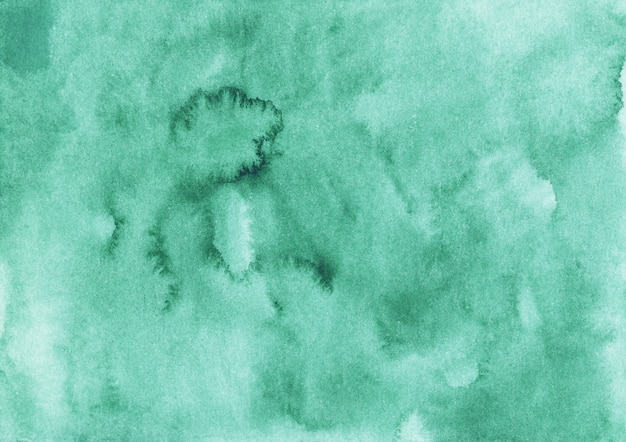 水彩エメラルド背景テクスチャ。アクワレル抽象的な緑の背景。手描き
